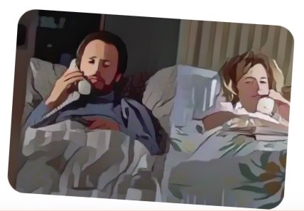 Two people having a comfortable conversation in bed, representing the companionship and support offered by Just A Friend